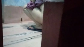 desi bhabi pissing and naughty son using his mobile quickly to take the video hiddenly
